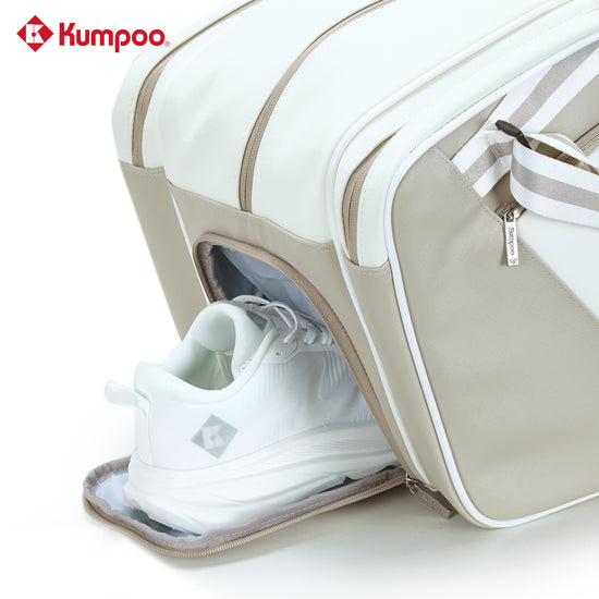 Kumpoo KB-691 badminton bag with multiple compartments and shoulder strap, designed for carrying badminton rackets and gear.