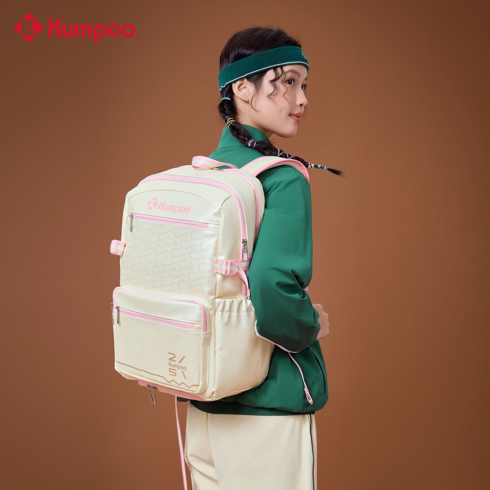 Kumpoo KB-5212.25th badminton bag with multiple compartments and padded straps for carrying badminton rackets and gear.
