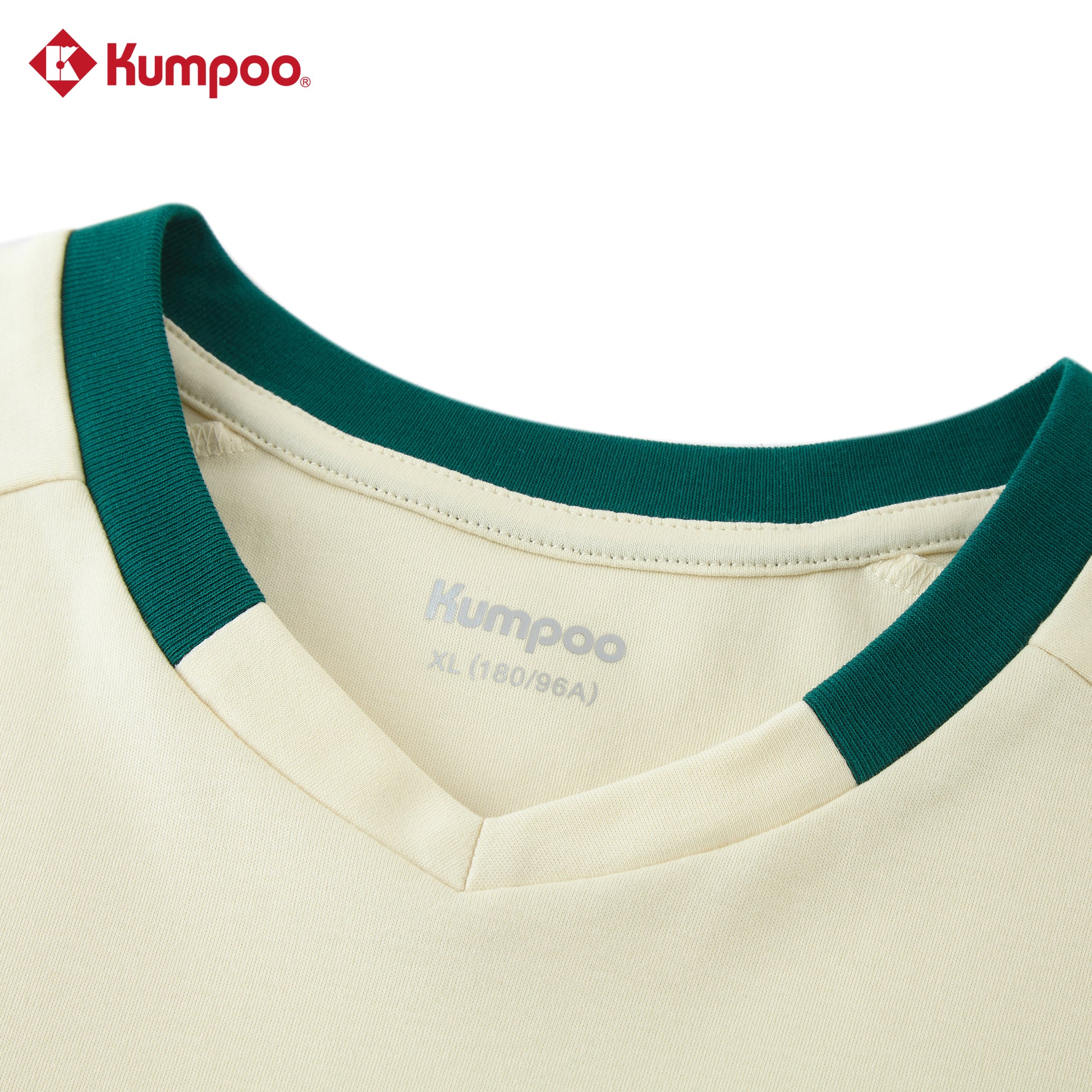 Kumpoo K261U-1528.25th unisex T-shirt in a casual fit, featuring a plain design and short sleeves, displayed on a hanger.