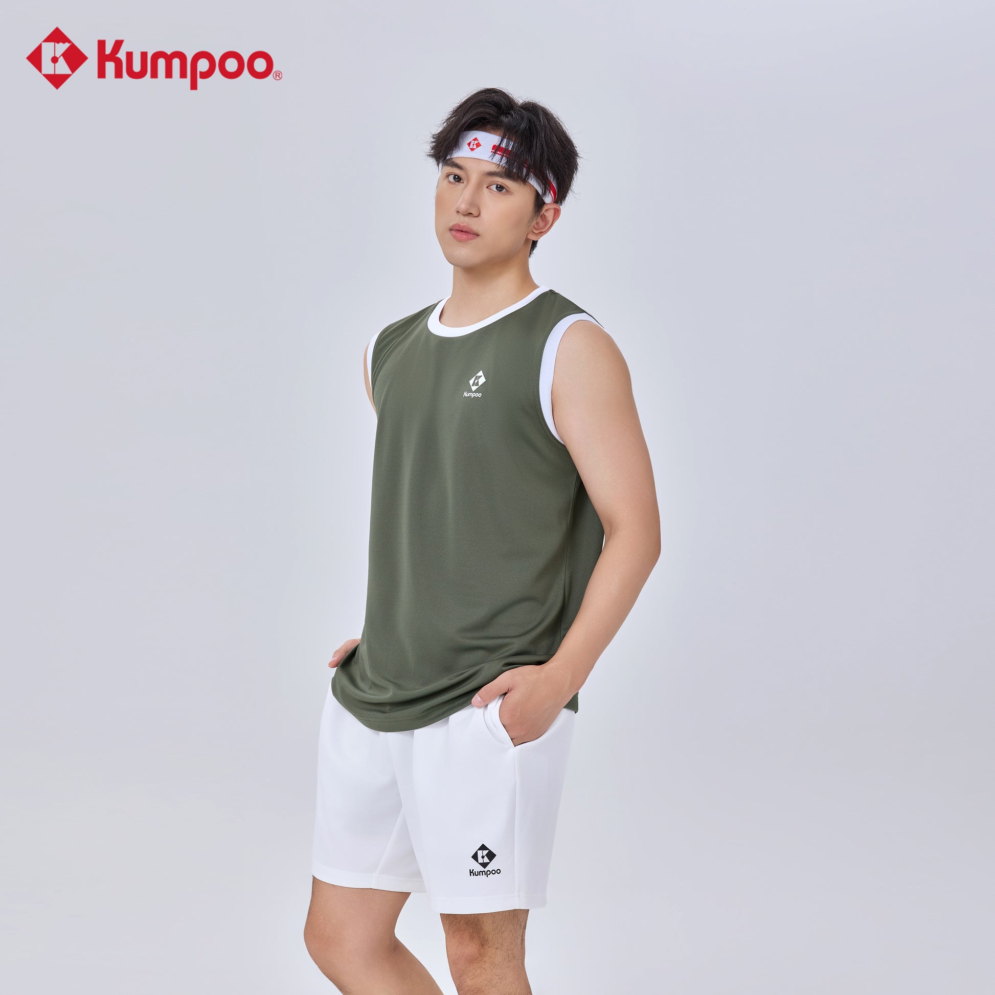 Kumpoo K261U-2059 men's performance sports shorts for badminton, pickleball, tennis, and casual wear, shown on a model.